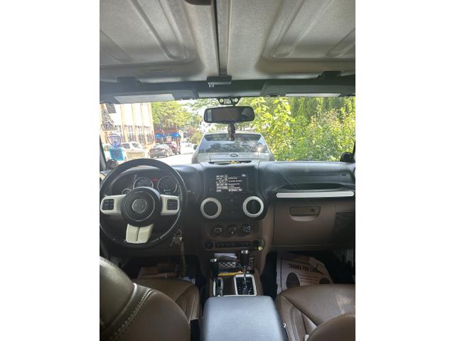 Photo of 2013 White Jeep Wrangler Unlimited