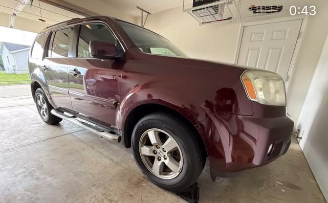 Photo of 2010 Red Honda Pilot