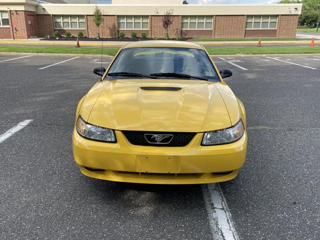 Photo of 1999 Yellow Ford Mustang