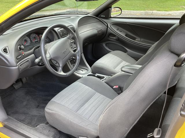 Photo of 1999 Yellow Ford Mustang