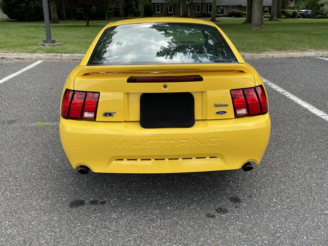 Photo of 1999 Yellow Ford Mustang