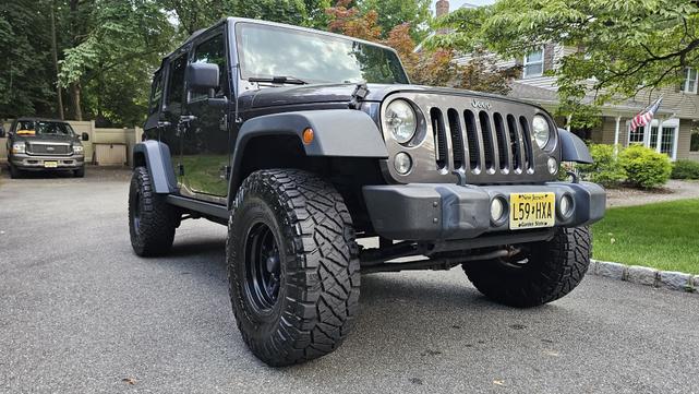Photo of 2014 Gray Jeep Wrangler Unlimited