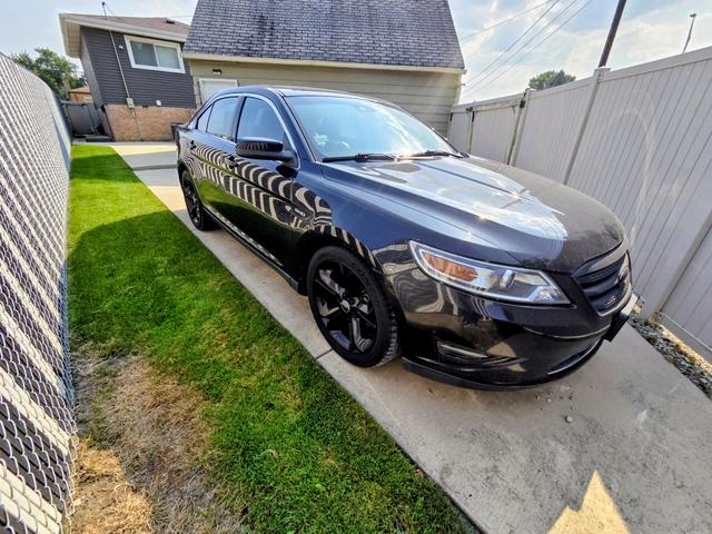 Photo of 2010 Black Ford Taurus