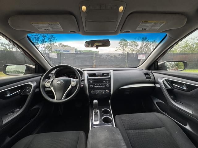 Photo of 2014 Red Nissan Altima