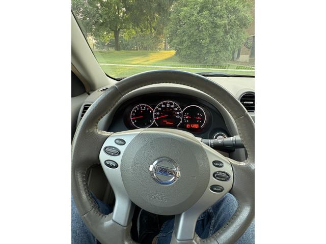 Photo of 2010 Red Nissan Altima