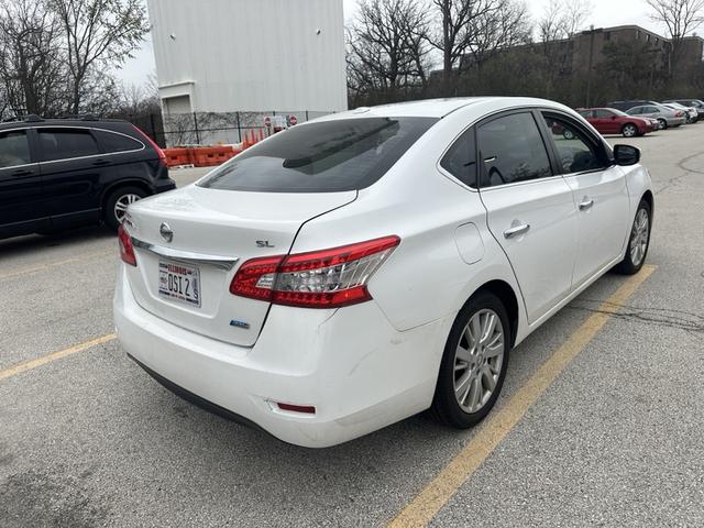 Photo of 2013 White Nissan Sentra