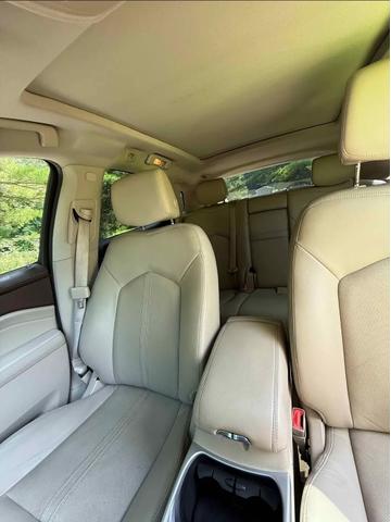 Photo of 2011 Gold Cadillac SRX