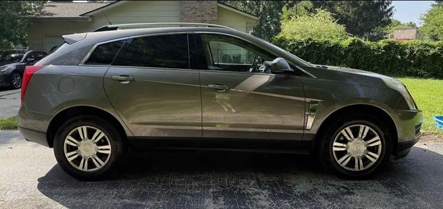 Photo of 2011 Gold Cadillac SRX
