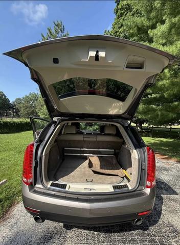 Photo of 2011 Gold Cadillac SRX