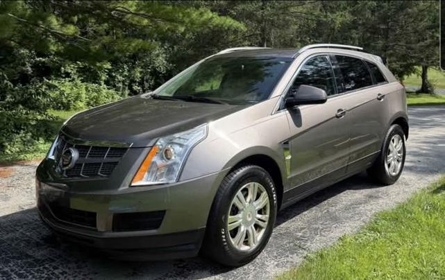 Photo of 2011 Gold Cadillac SRX