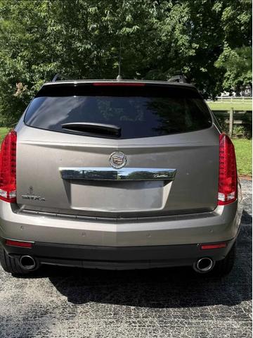 Photo of 2011 Gold Cadillac SRX