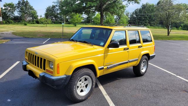 Photo of 2001 Yellow Jeep Cherokee