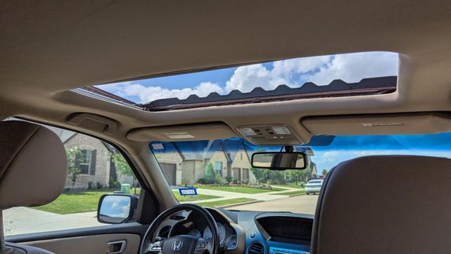 Photo of 2011 Red Honda Pilot