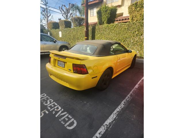 Photo of 2004 Yellow Ford Mustang