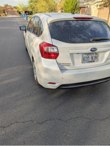 Photo of 2016 White Subaru Impreza
