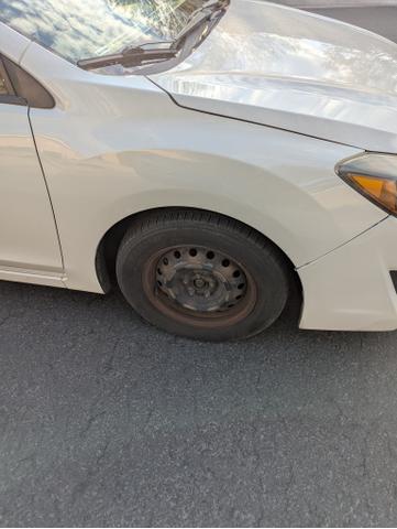 Photo of 2016 White Subaru Impreza
