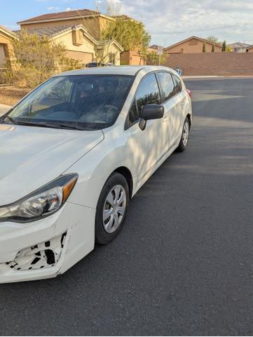 Photo of 2016 White Subaru Impreza