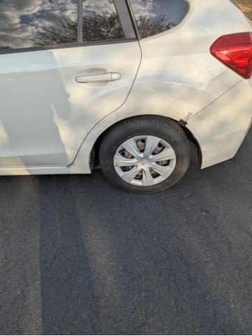 Photo of 2016 White Subaru Impreza