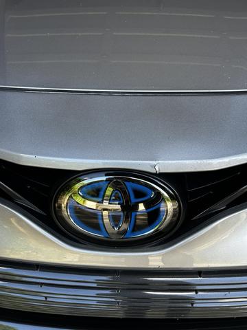 Photo of 2023 Silver Toyota Camry Hybrid