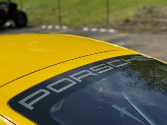 Photo of 2024 Yellow Porsche 718 Cayman