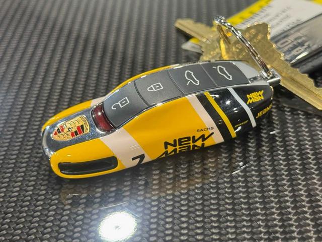 Photo of 2024 Yellow Porsche 718 Cayman