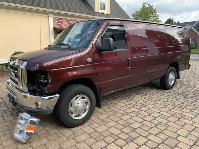Photo of 2010 Red Ford E350 Super Duty