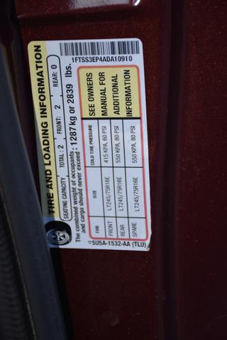 Photo of 2010 Red Ford E350 Super Duty