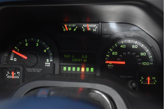 Photo of 2010 Red Ford E350 Super Duty