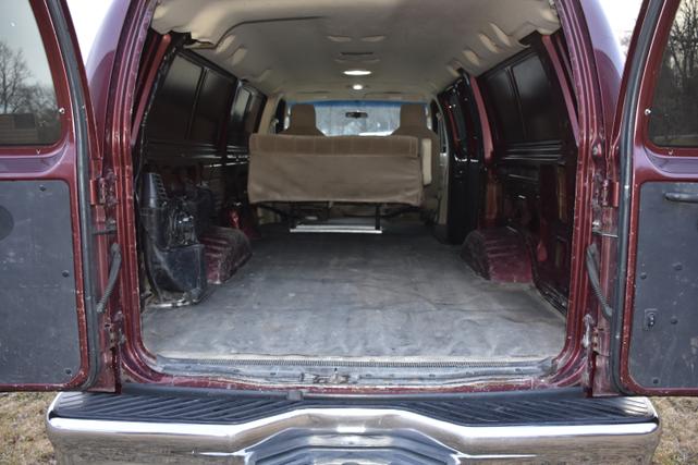Photo of 2010 Red Ford E350 Super Duty