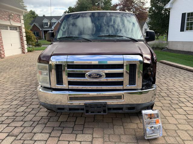 Photo of 2010 Red Ford E350 Super Duty