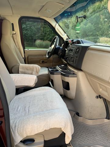 Photo of 2010 Red Ford E350 Super Duty