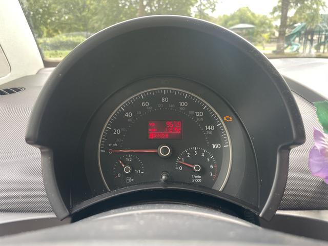 Photo of 2010 Orange Volkswagen New Beetle