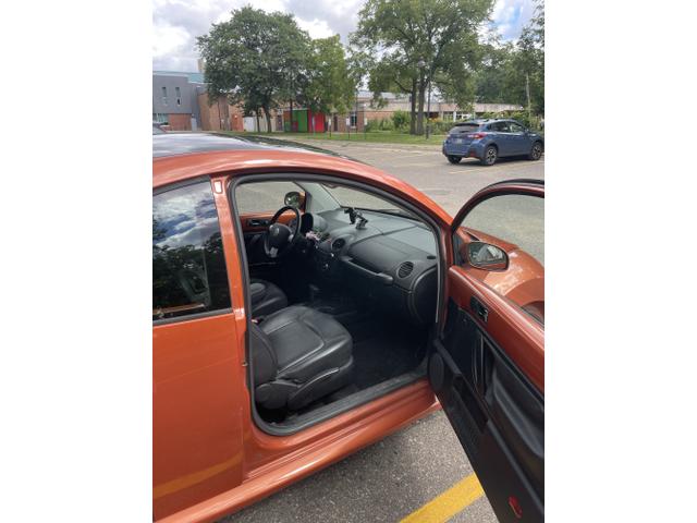 Photo of 2010 Orange Volkswagen New Beetle