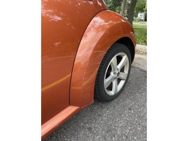 Photo of 2010 Orange Volkswagen New Beetle