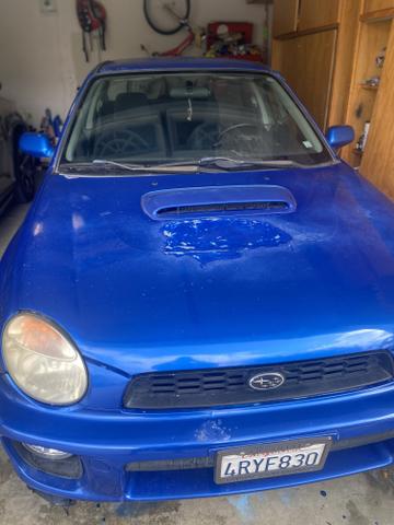 Photo of 2002 Blue Subaru Impreza