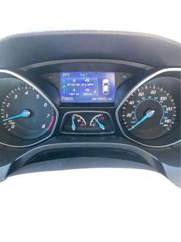 Photo of 2014 White Ford Focus