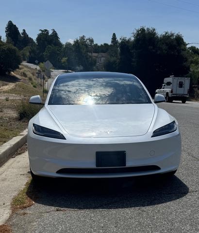 Photo of 2024 White Tesla Model 3