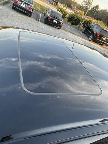 Photo of 2011 Black Cadillac DTS