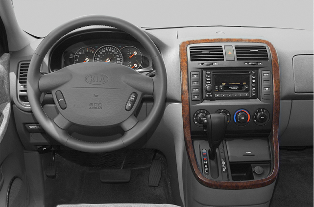 2002 - 2005 KIA SEDONA Katzkin Leather Interior (electric driver seat) (3  row)
