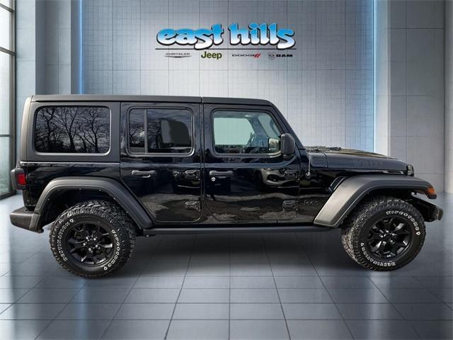 used 2023 Jeep Wrangler car, priced at $30,180