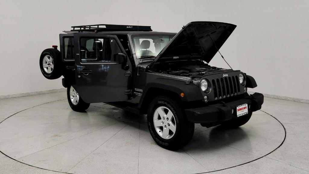 used 2017 Jeep Wrangler Unlimited car, priced at $14,395