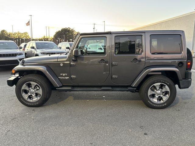 used 2018 Jeep Wrangler JK Unlimited car, priced at $19,488