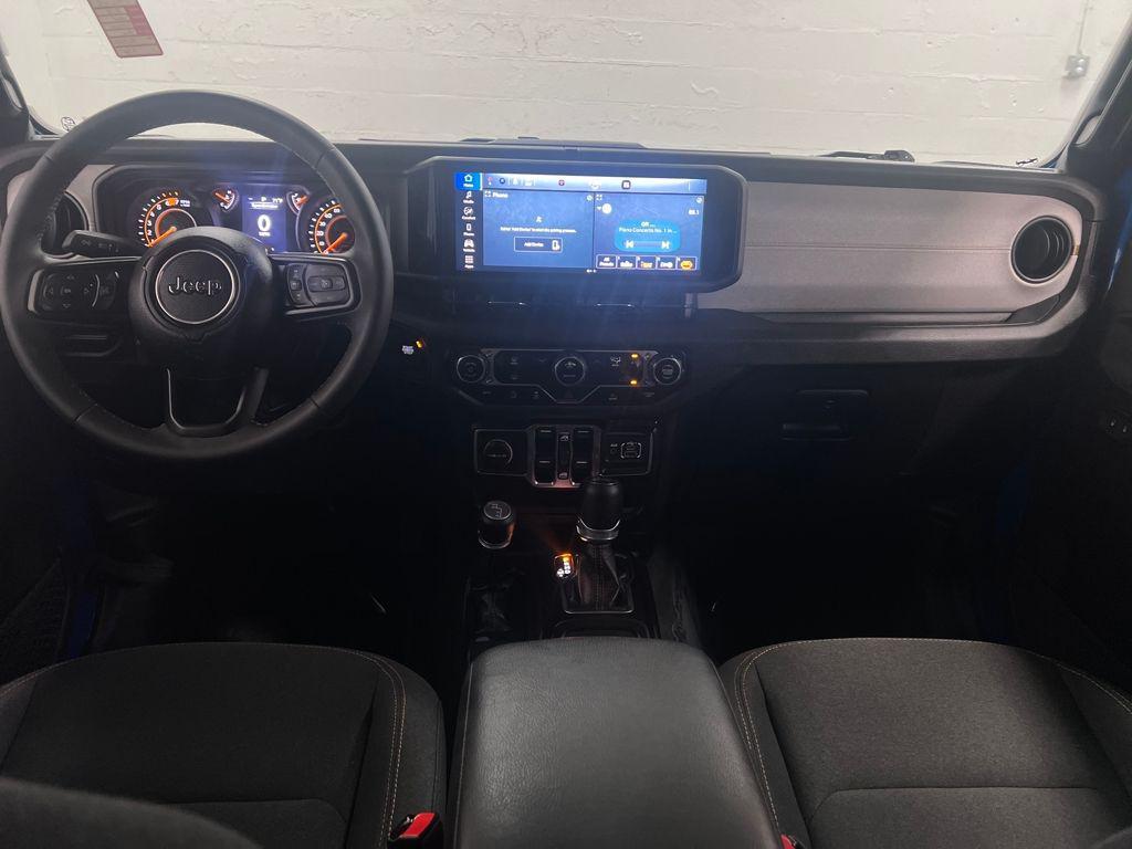 used 2024 Jeep Wrangler car, priced at $35,694