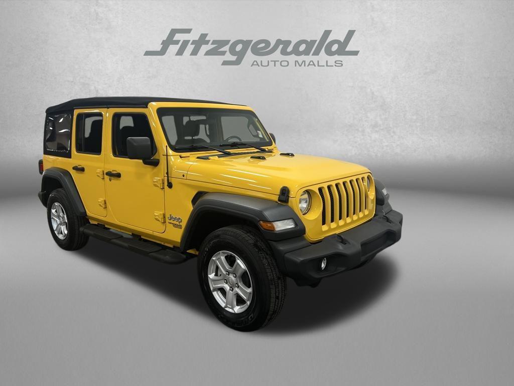 used 2021 Jeep Wrangler Unlimited car, priced at $27,394