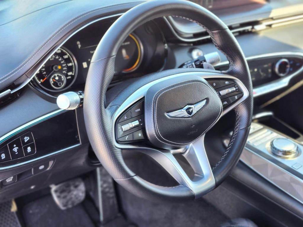 used 2025 Genesis GV70 car, priced at $53,877