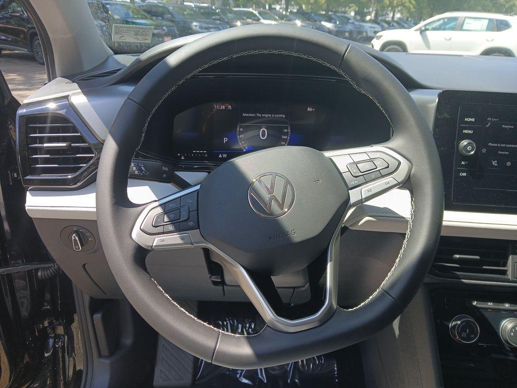 new 2025 Volkswagen Taos car, priced at $22,800