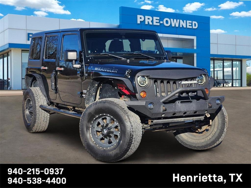 used 2012 Jeep Wrangler Unlimited car, priced at $14,687