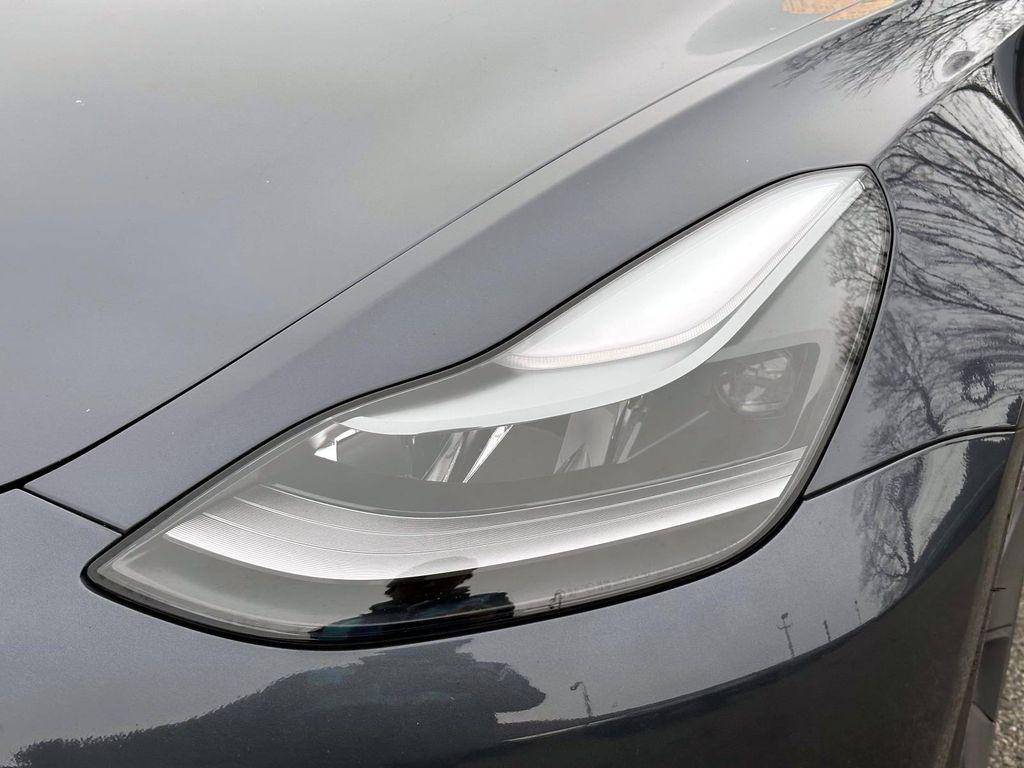 used 2023 Tesla Model 3 car, priced at $27,480