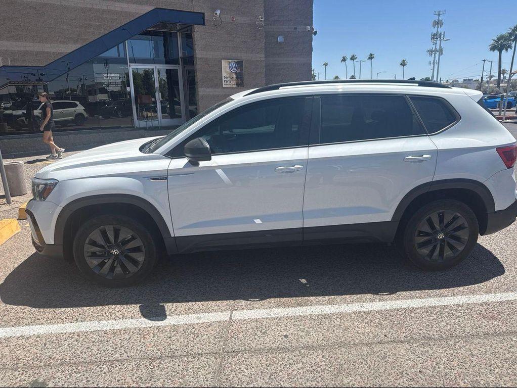 used 2023 Volkswagen Taos car, priced at $17,139
