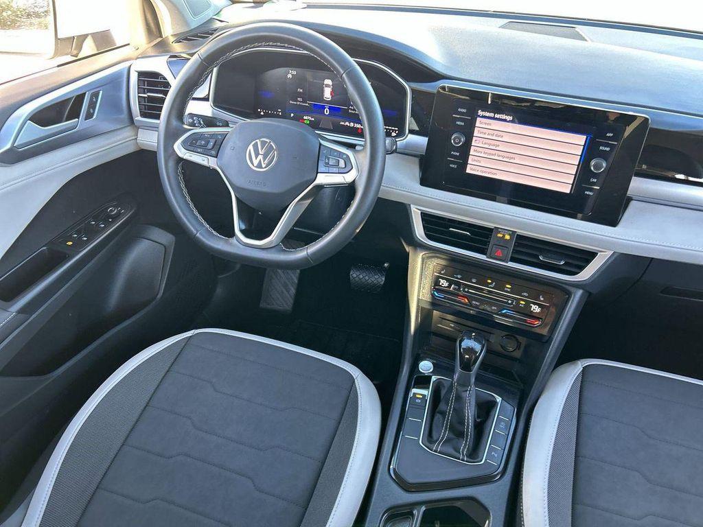 used 2025 Volkswagen Taos car, priced at $23,952